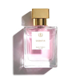 Perfume bottle with gold cap on a white background