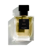 Perfume bottle labeled 'REIGN' on a white background