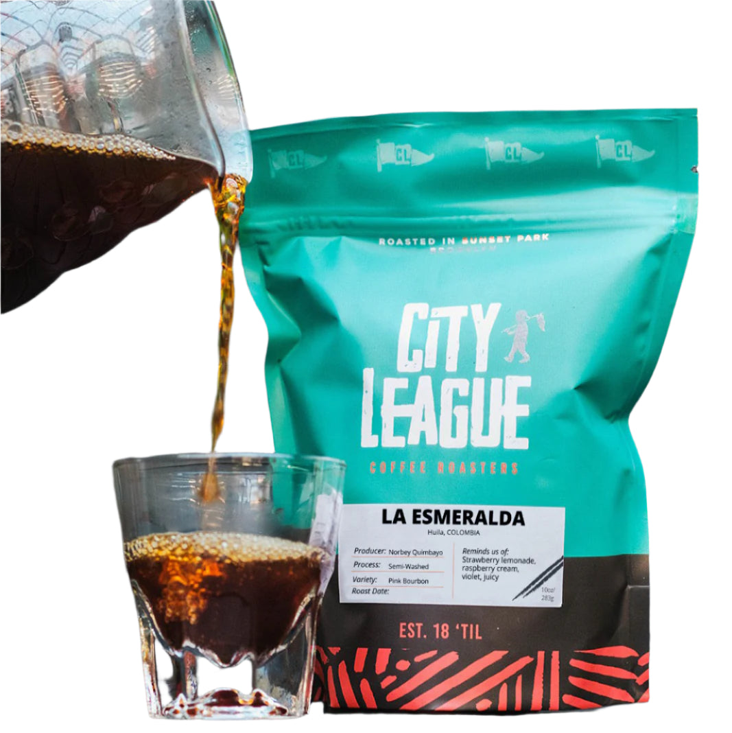 City League coffee bag with a glass of coffee being poured from it.
