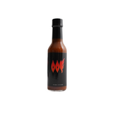 Hot sauce bottle with a black label featuring red text on a white background