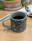 Katie Merz Olive Green Mug with Black Glyph Art