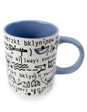 Katie Merz Mug with Blue Handle and Glyph Art
