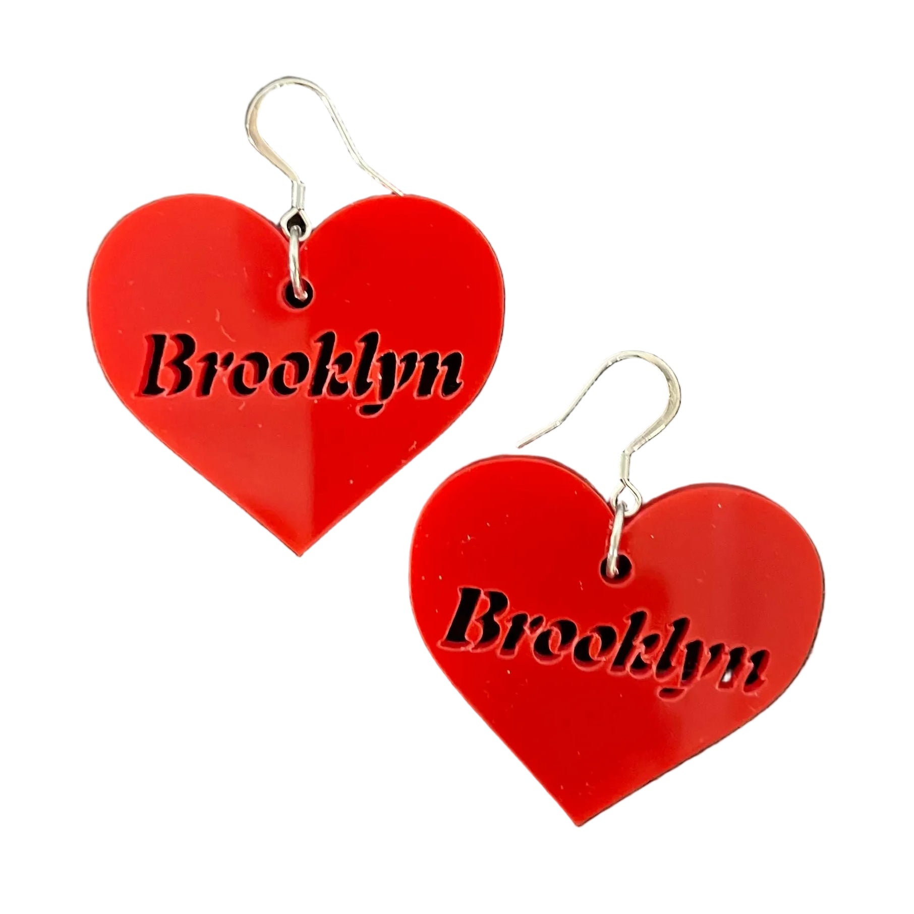 Red heart-shaped earrings with 'Brooklyn' text on a white background