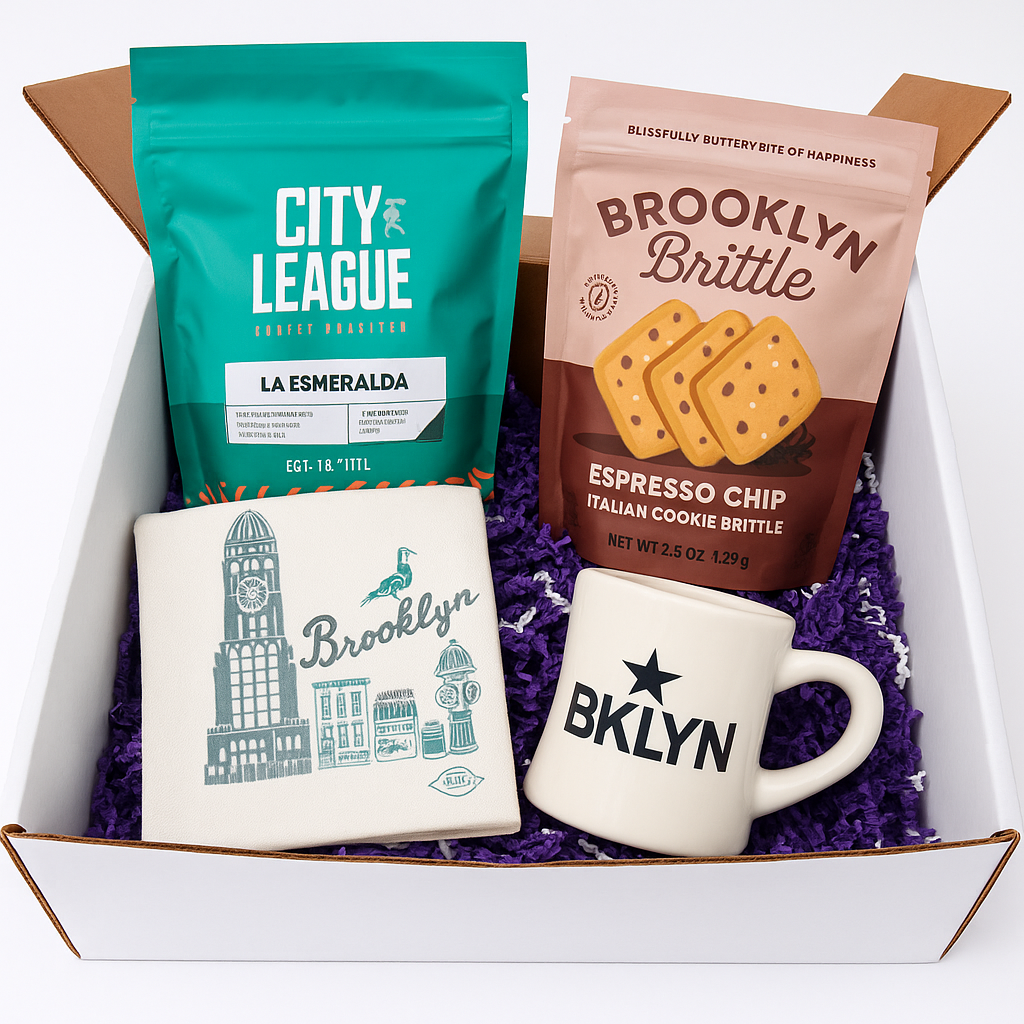 Gift set with 'City League' coffee, 'Brooklyn Brittle', and two mugs in a box.