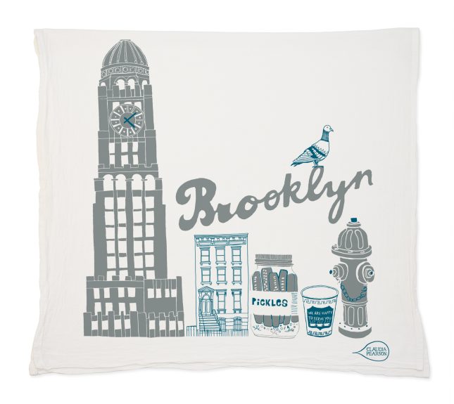 Tea Towel with Brooklyn-themed design featuring a clock tower, building, fire hydrant, and cup.
