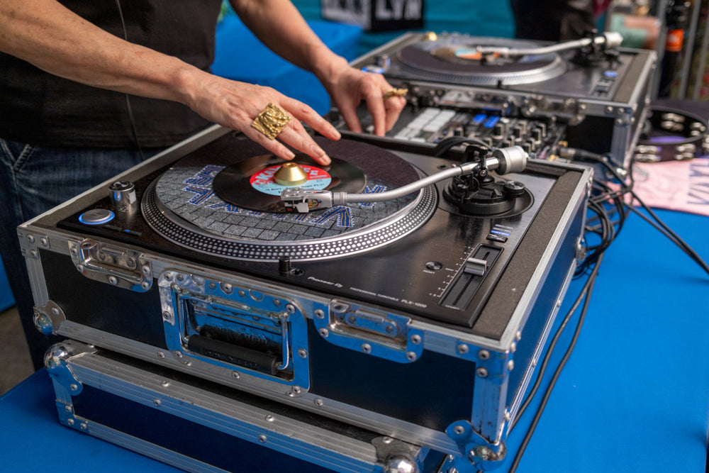 Vinyl DJ’s Hands on the Decks at Vinyl Nights, Albee Square Br