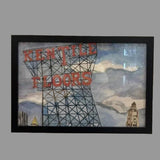 Framed artwork with 'Kentile Floors' text on a geometric design